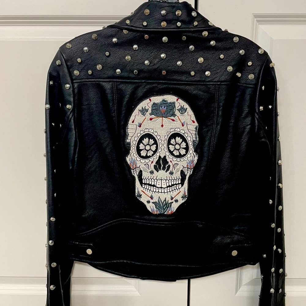 ZARA BRAND NEW sz sm motorcycle style faux leather jacket w/skull back. Tags on